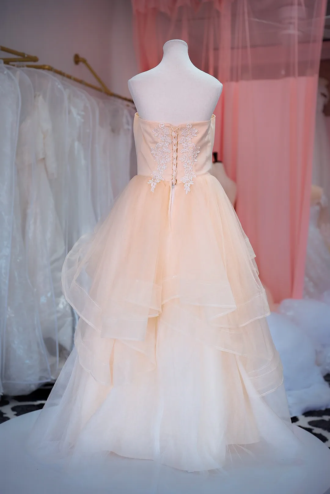 Peach tiered tulle wedding gown photo 3