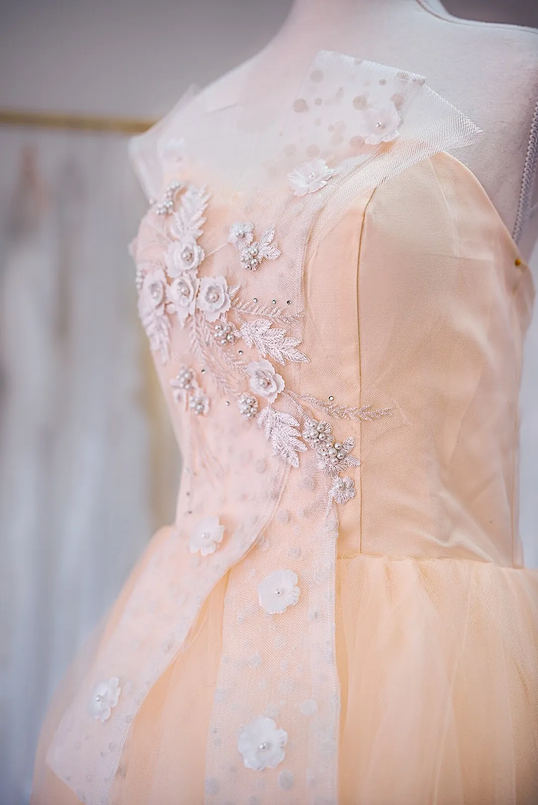 Peach tiered tulle wedding gown photo 4