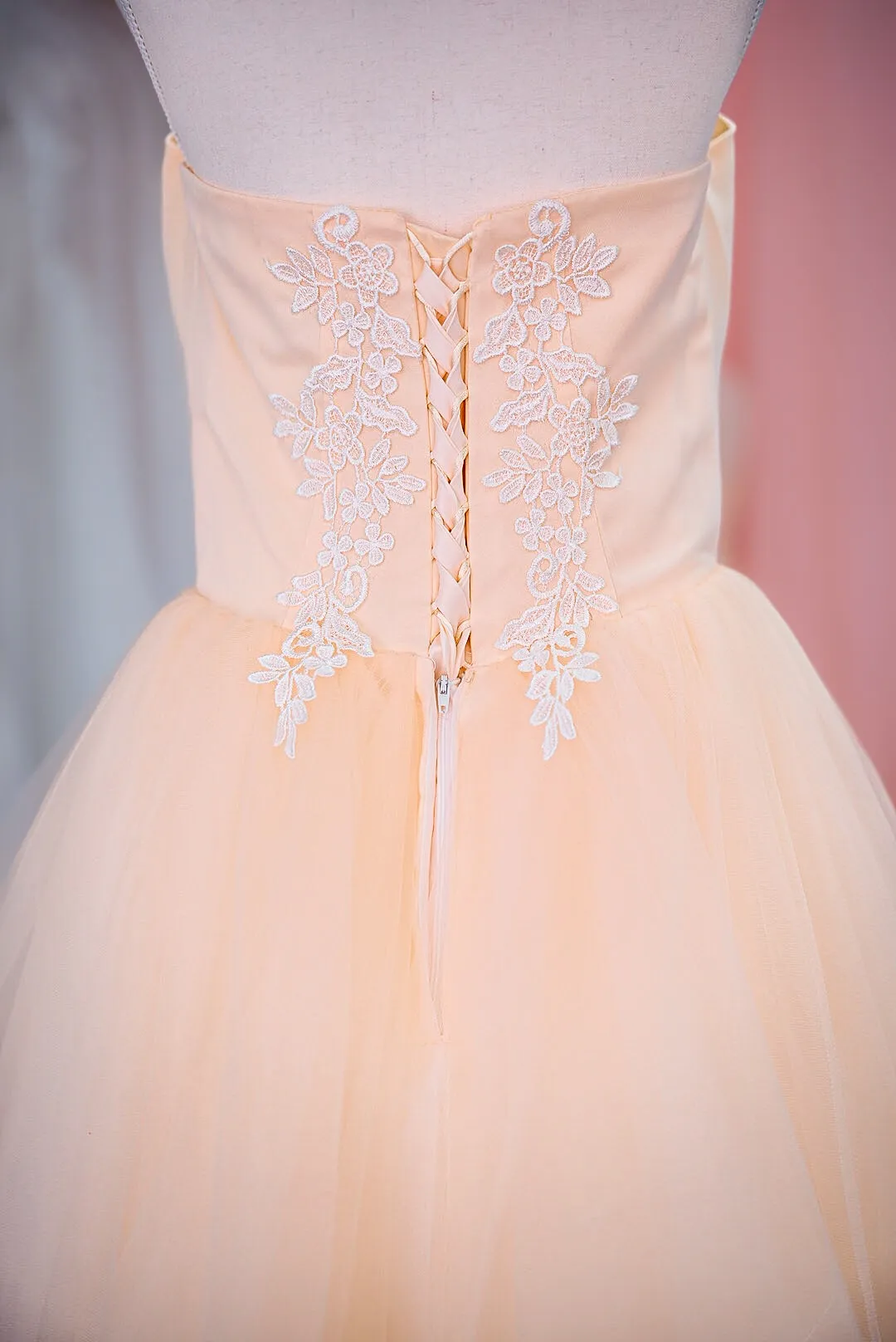 Peach tiered tulle wedding gown photo 5