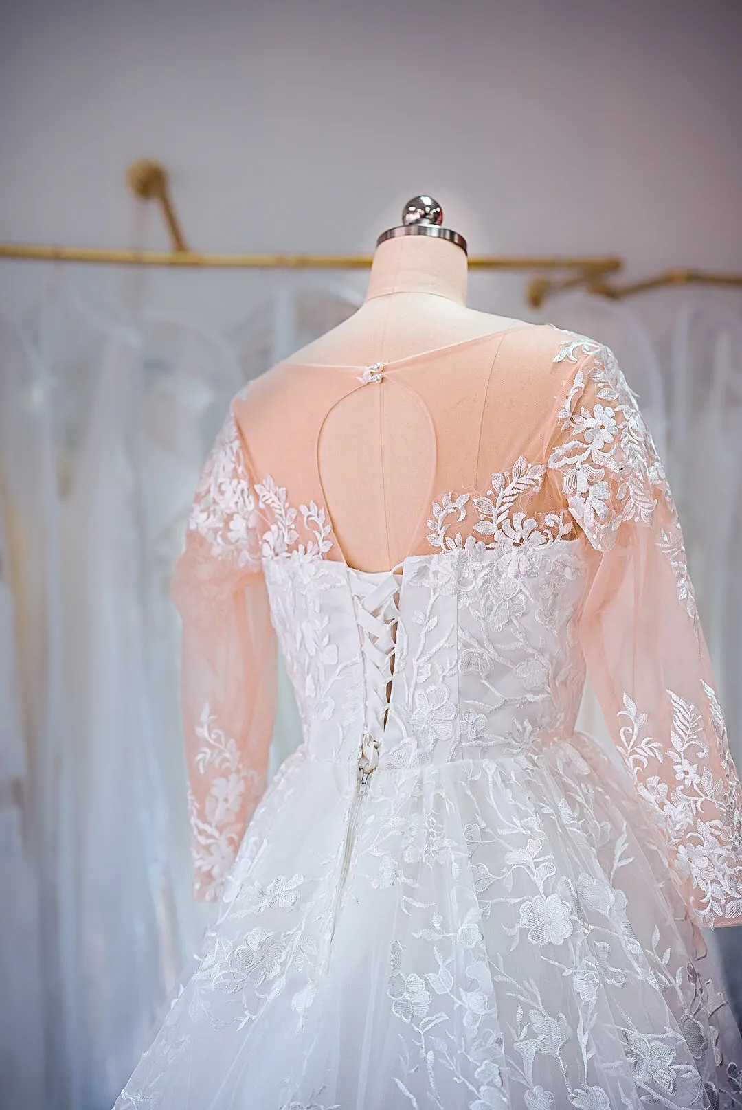 White long sleeve lace wedding gown photo 6