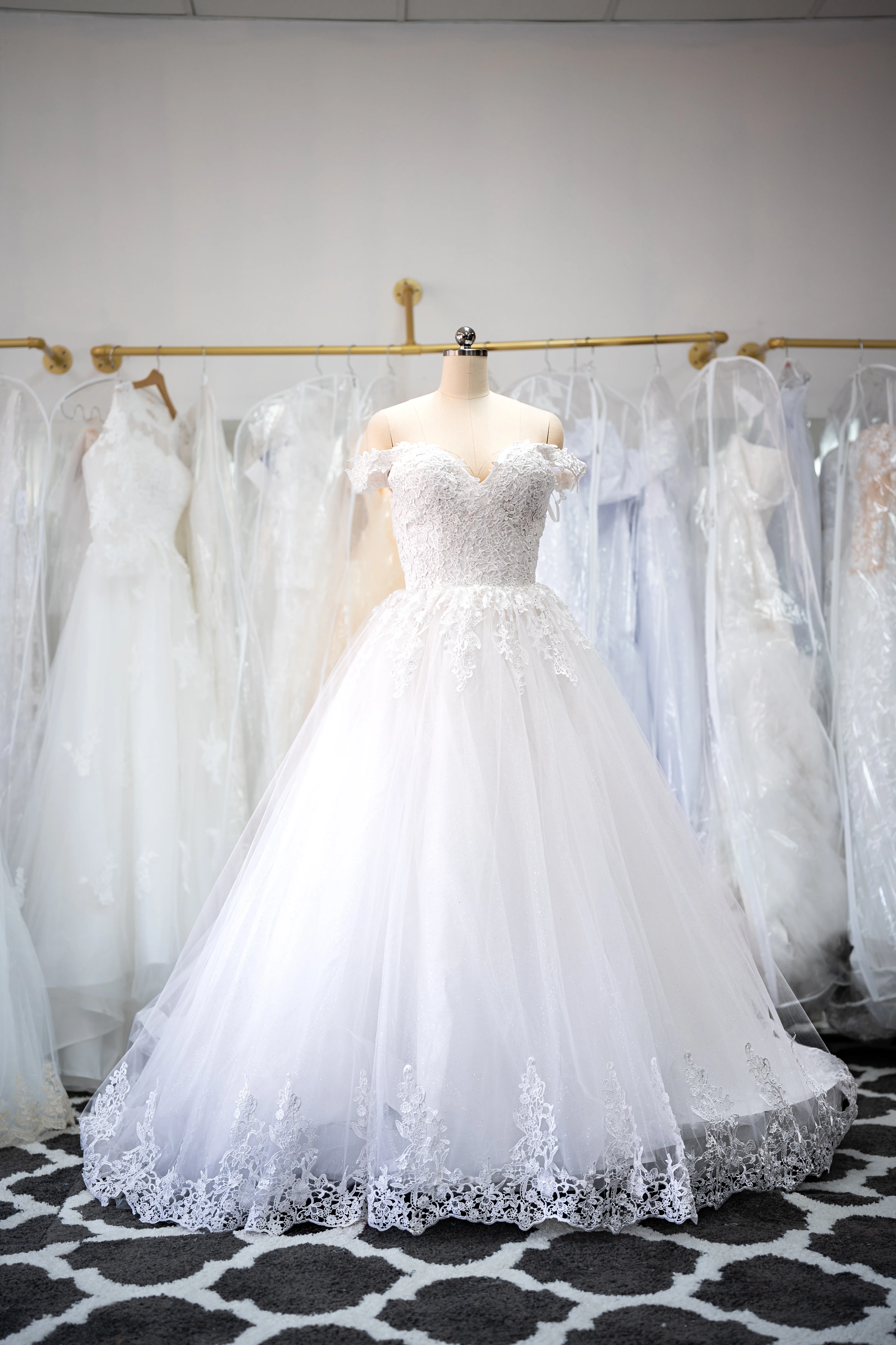 White cap-sleeve lace wedding gown