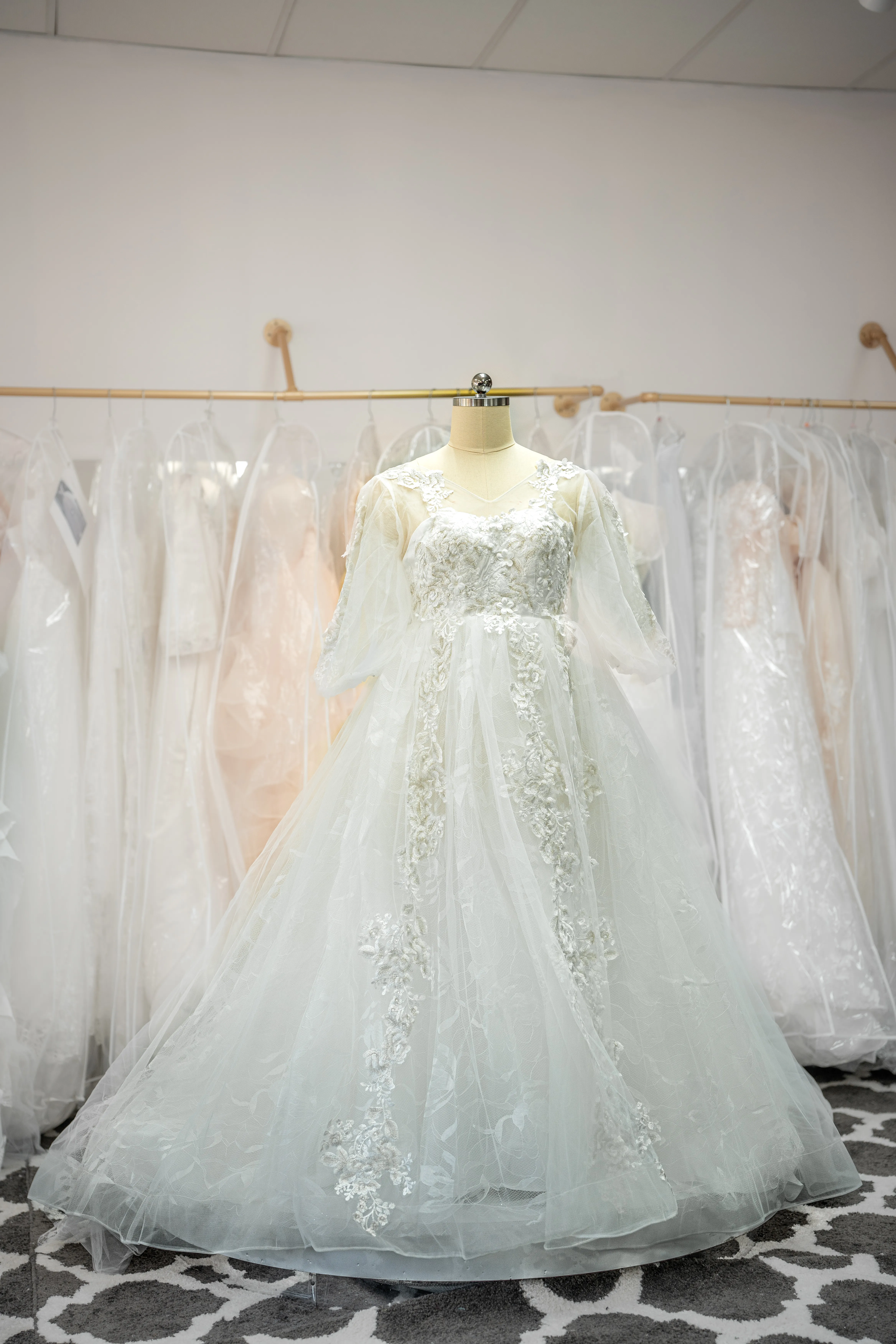 Ivory beaded lace wedding gown
