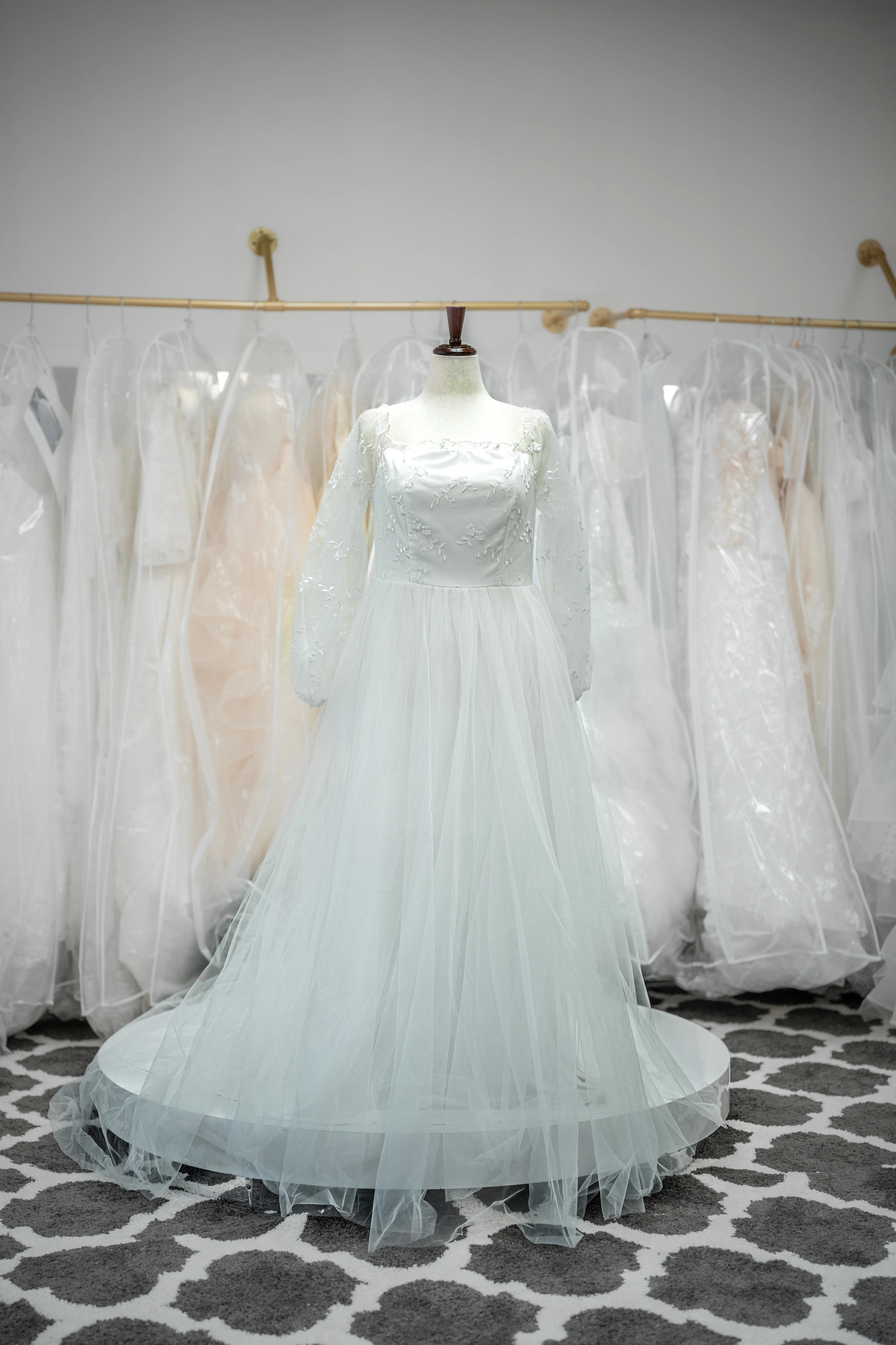 White lace-sleeve satin wedding dress