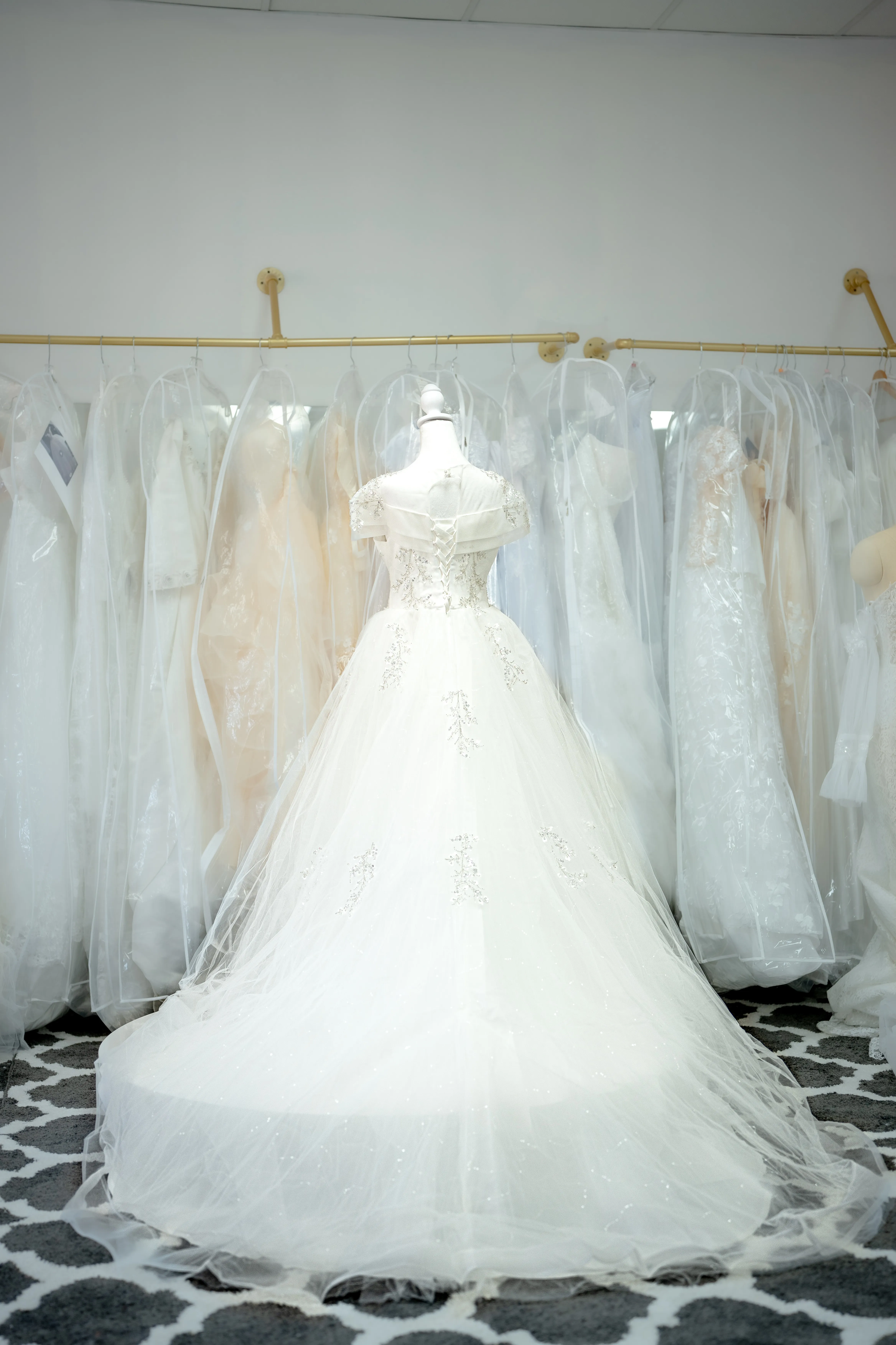 White off-shoulder floral lace wedding gown photo 2
