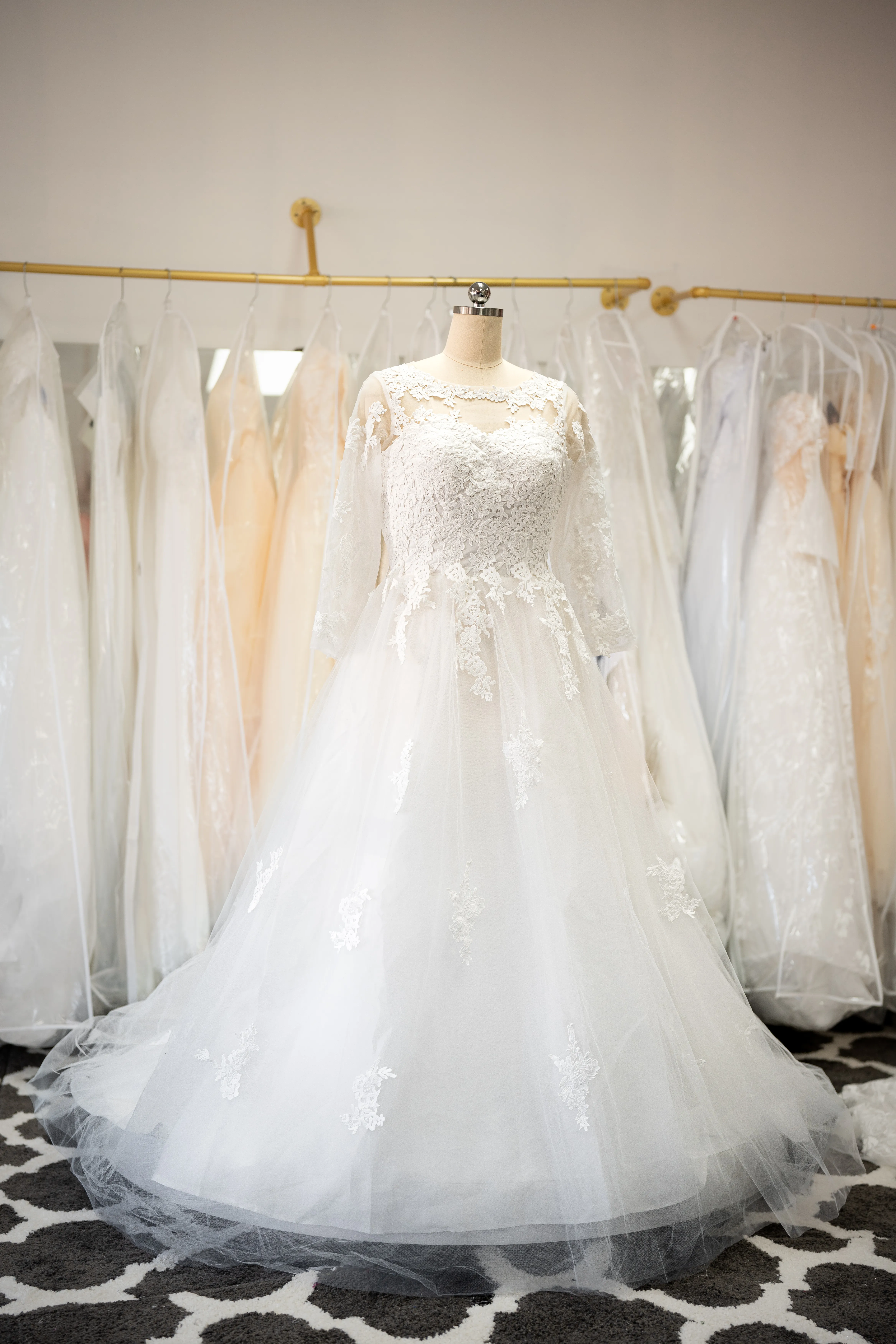 Ivory long sleeve lace wedding gown