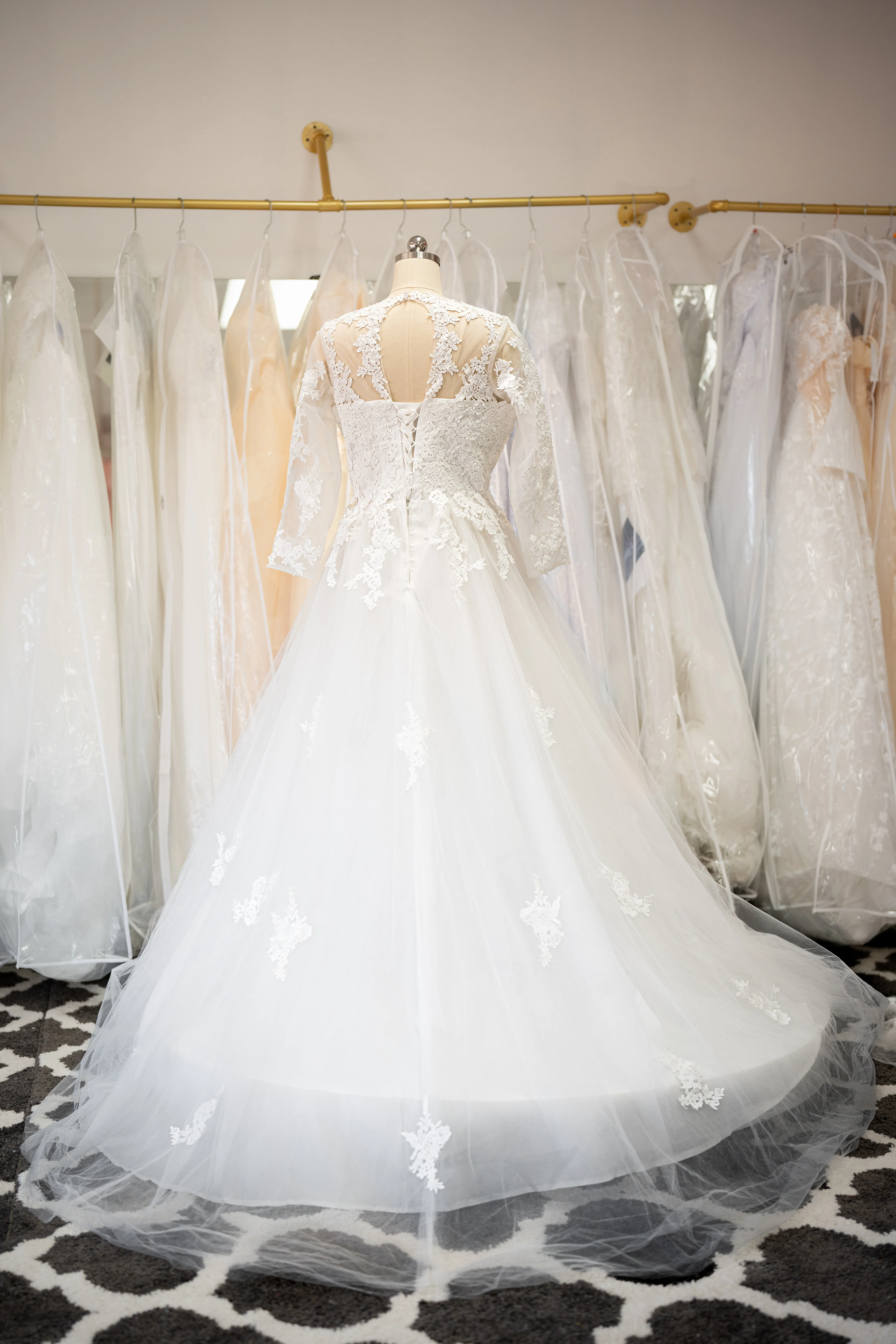 Ivory long sleeve lace wedding gown photo 2