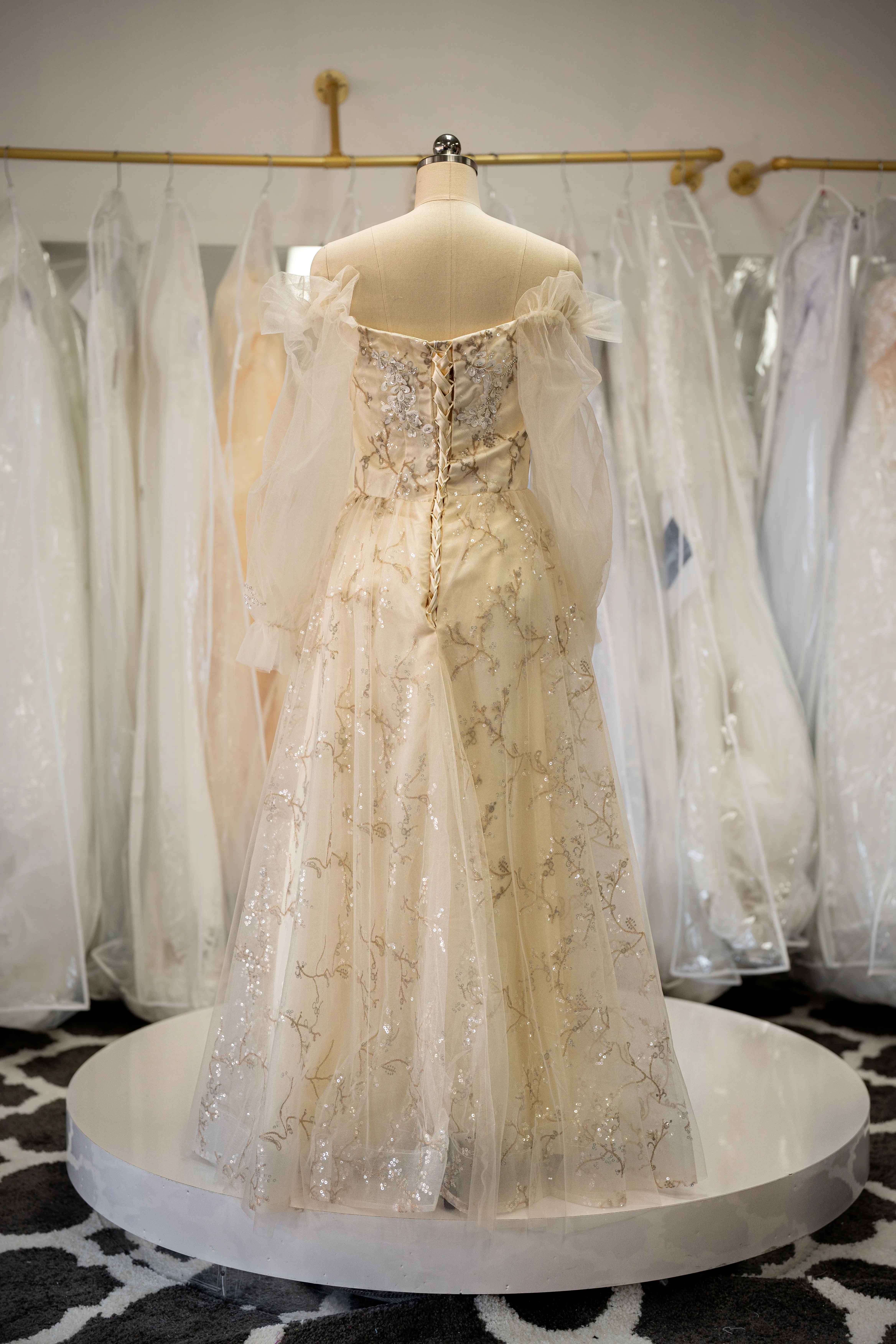 Champagne sequin gown with sheer sleeves photo 2