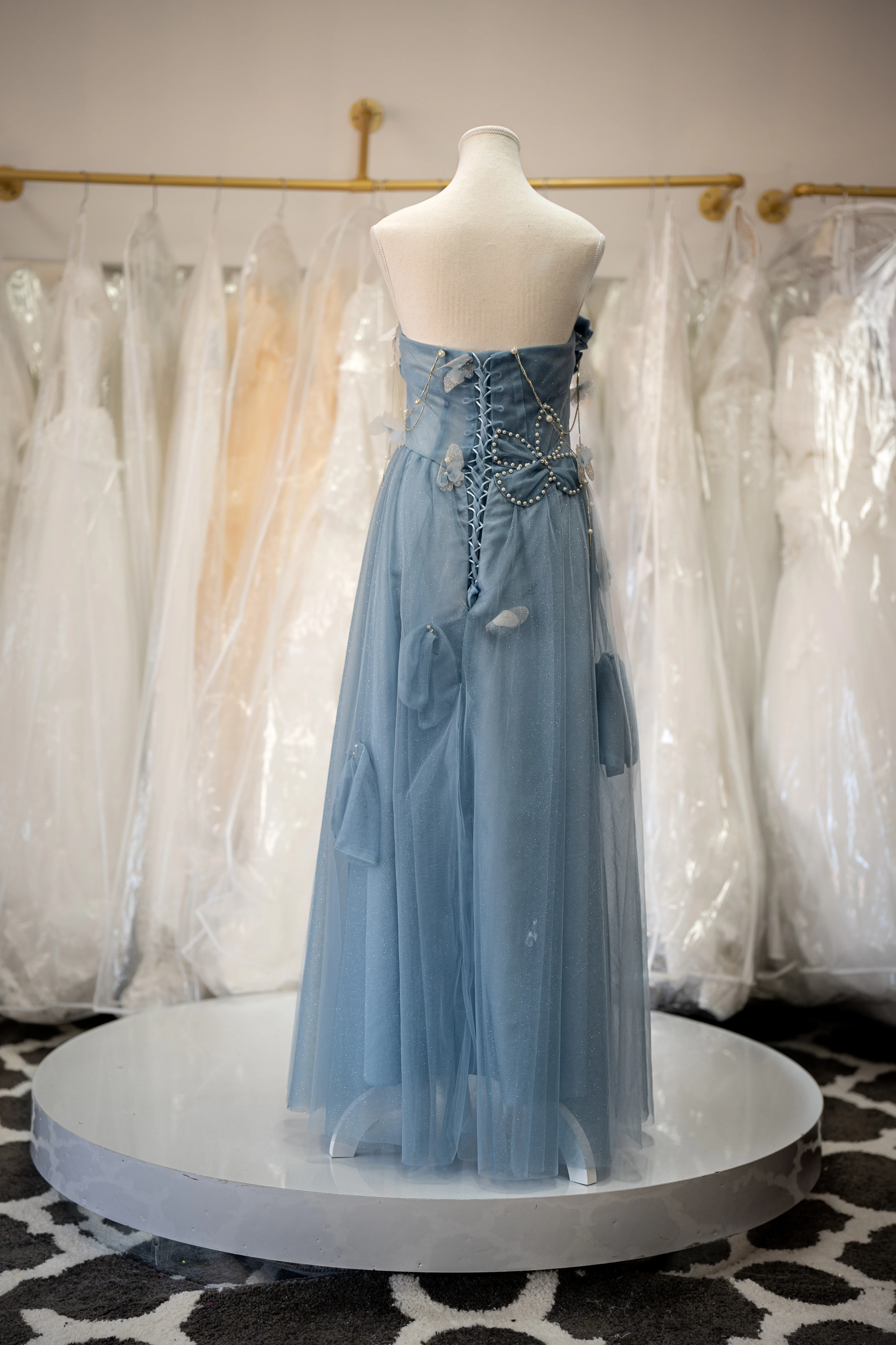 Dusty blue tulle gown with butterfly appliqués photo 2